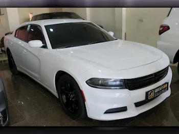 Dodge  Charger  2019  Automatic  84,000 Km  6 Cylinder  Rear Wheel Drive (RWD)  Sedan  White