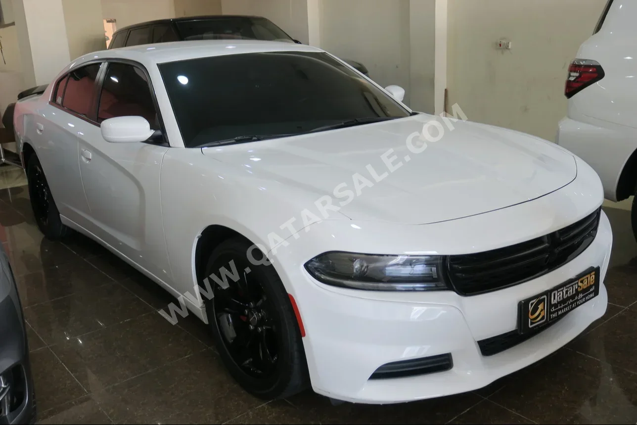 Dodge  Charger  2019  Automatic  84,000 Km  6 Cylinder  Rear Wheel Drive (RWD)  Sedan  White