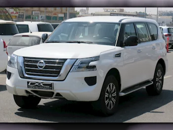 Nissan  Patrol  XE  2021  Automatic  62,000 Km  6 Cylinder  Four Wheel Drive (4WD)  SUV  White  With Warranty