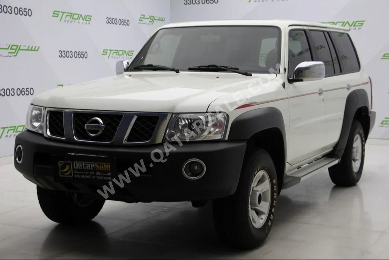 Nissan  Patrol  GL  2021  Manual  33,000 Km  6 Cylinder  Four Wheel Drive (4WD)  SUV  White  With Warranty