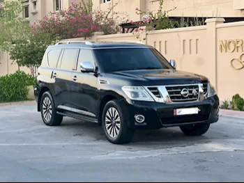 Nissan  Patrol  Platinum  2014  Automatic  240,000 Km  8 Cylinder  Four Wheel Drive (4WD)  SUV  Black