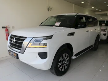  Nissan  Patrol  XE  2021  Automatic  90,000 Km  6 Cylinder  Four Wheel Drive (4WD)  SUV  White  With Warranty