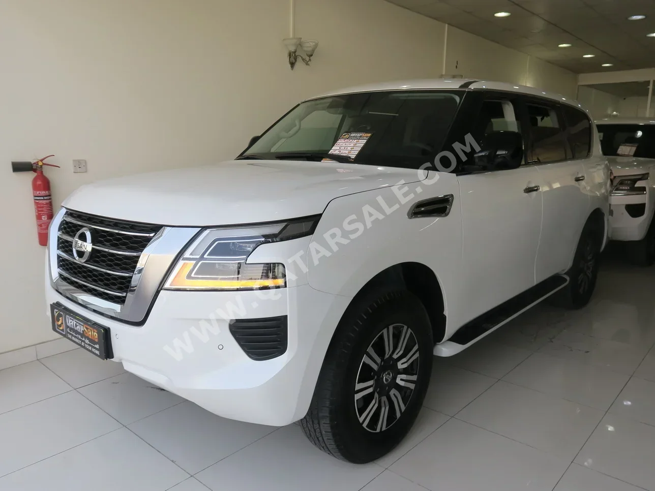  Nissan  Patrol  XE  2021  Automatic  90,000 Km  6 Cylinder  Four Wheel Drive (4WD)  SUV  White  With Warranty