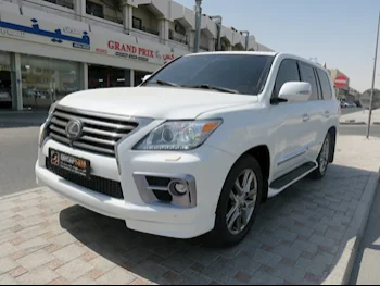 Lexus  LX  570  2014  Automatic  203,000 Km  8 Cylinder  Four Wheel Drive (4WD)  SUV  White