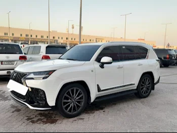 Lexus  LX  600 F Sport  2023  Automatic  50,000 Km  6 Cylinder  Four Wheel Drive (4WD)  SUV  White  With Warranty