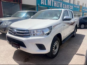 Toyota  Hilux  2019  Automatic  74,000 Km  4 Cylinder  Rear Wheel Drive (RWD)  Pick Up  White