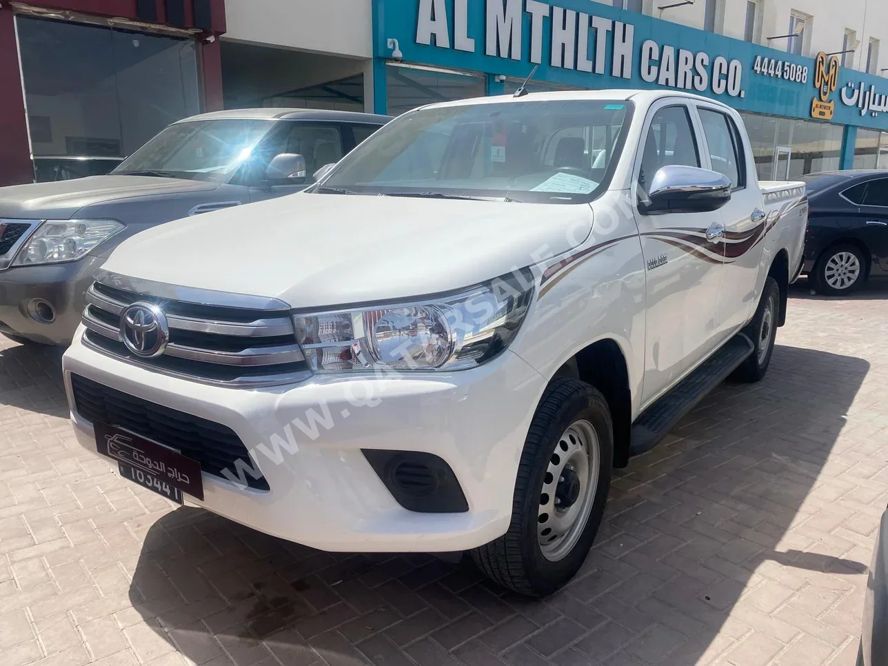 Toyota  Hilux  2019  Automatic  74,000 Km  4 Cylinder  Rear Wheel Drive (RWD)  Pick Up  White