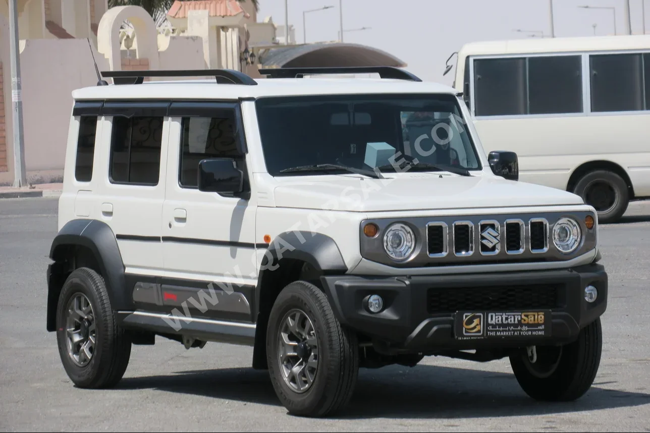  Suzuki  Jimny  2024  Automatic  8,700 Km  4 Cylinder  Four Wheel Drive (4WD)  SUV  White  With Warranty