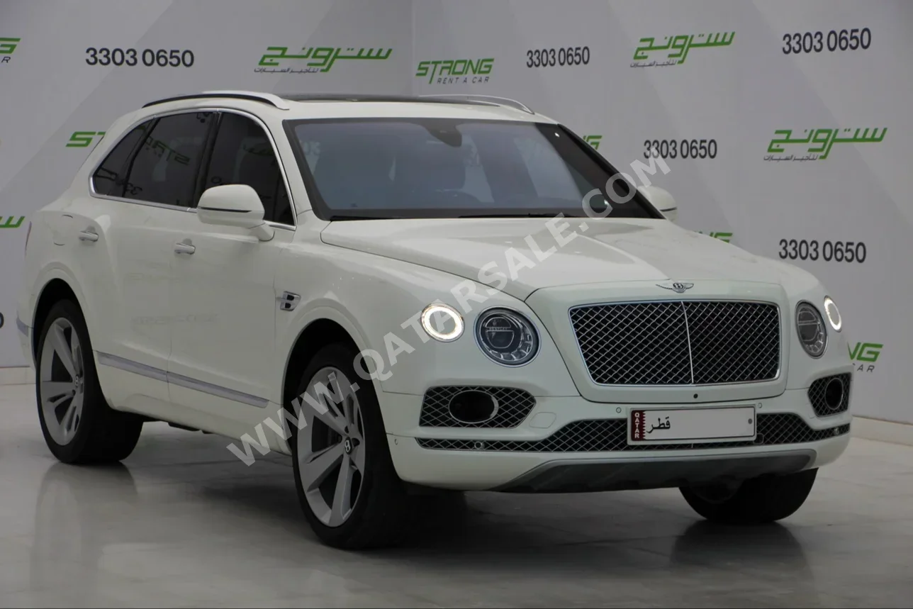 Bentley  Bentayga  2018  Automatic  140,000 Km  12 Cylinder  Four Wheel Drive (4WD)  SUV  White