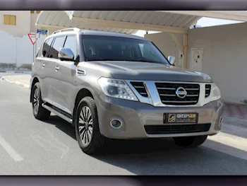 Nissan  Patrol  Platinum  2016  Automatic  187٬000 Km  8 Cylinder  Four Wheel Drive (4WD)  SUV  Gray