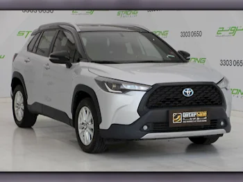 Toyota  Corolla  Cross Hybrid  2022  Automatic  62,000 Km  4 Cylinder  Front Wheel Drive (FWD)  SUV  Silver  With Warranty