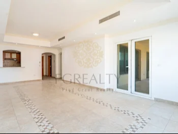 2 Bedrooms  Apartment  For Rent  in Doha -  The Pearl  Not Furnished