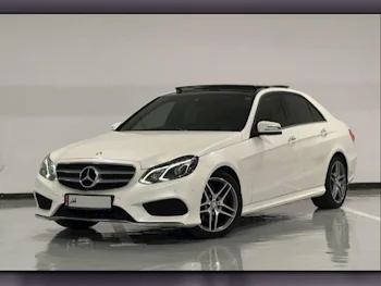 مرسيدس - بنز  اي - كلاس  300 AMG  2014  اوتوماتيك  58,000 كم  6 سلندر  دفع خلفي  سيدان  أبيض