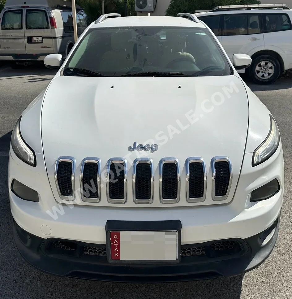 Jeep  Cherokee  2016  Automatic  103٬800 Km  6 Cylinder  Four Wheel Drive (4WD)  SUV  White