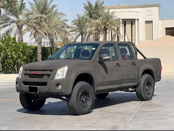 Isuzu  D-Max  2012  Manual  102,000 Km  4 Cylinder  Rear Wheel Drive (RWD)  Pick Up  Gray