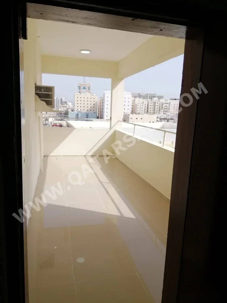 3 Bedrooms  Apartment  in Doha -  Al Mansoura  Not Furnished