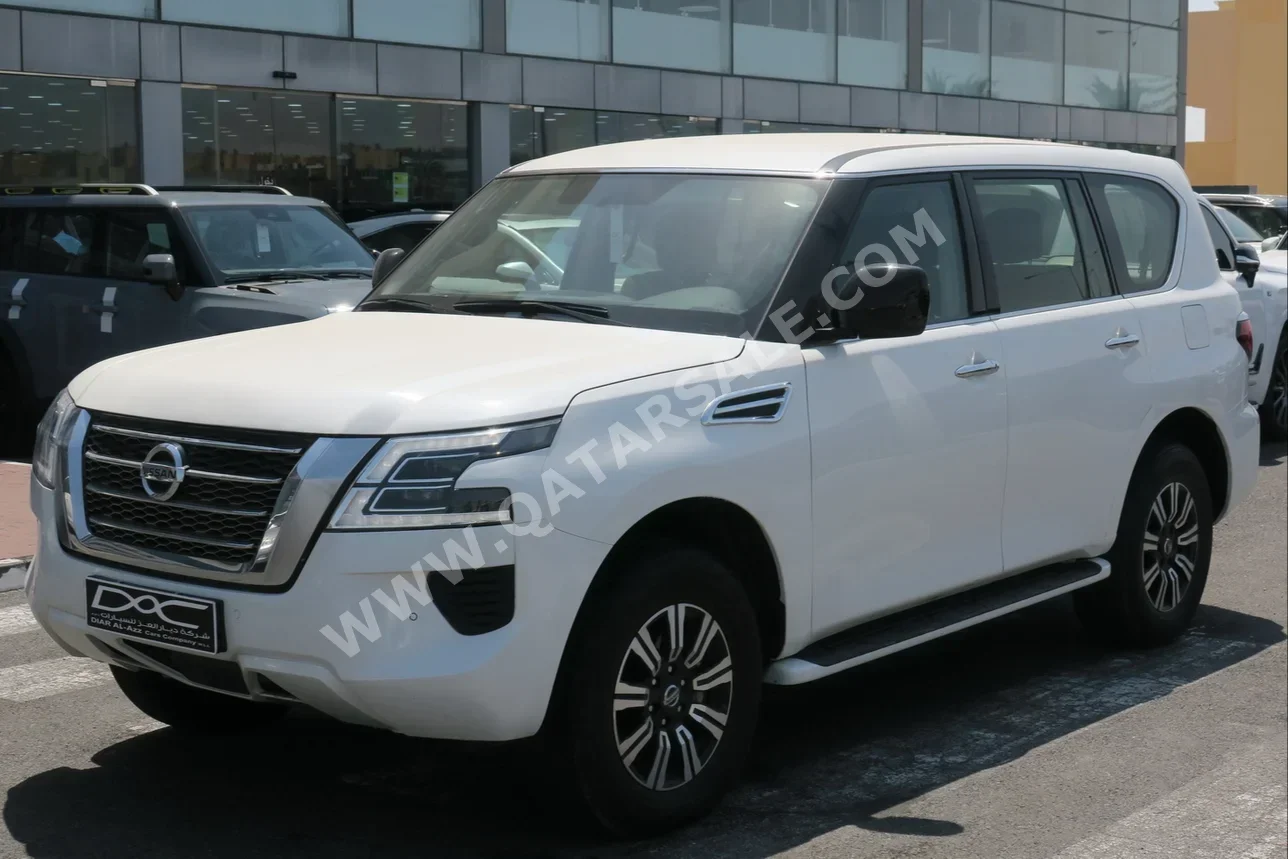 Nissan  Patrol  XE  2021  Automatic  62,000 Km  6 Cylinder  Four Wheel Drive (4WD)  SUV  White  With Warranty