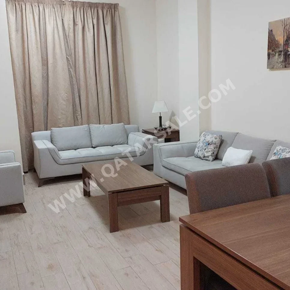 2 Bedrooms  Apartment  For Rent  in Doha -  Umm Ghuwailina  Fully Furnished