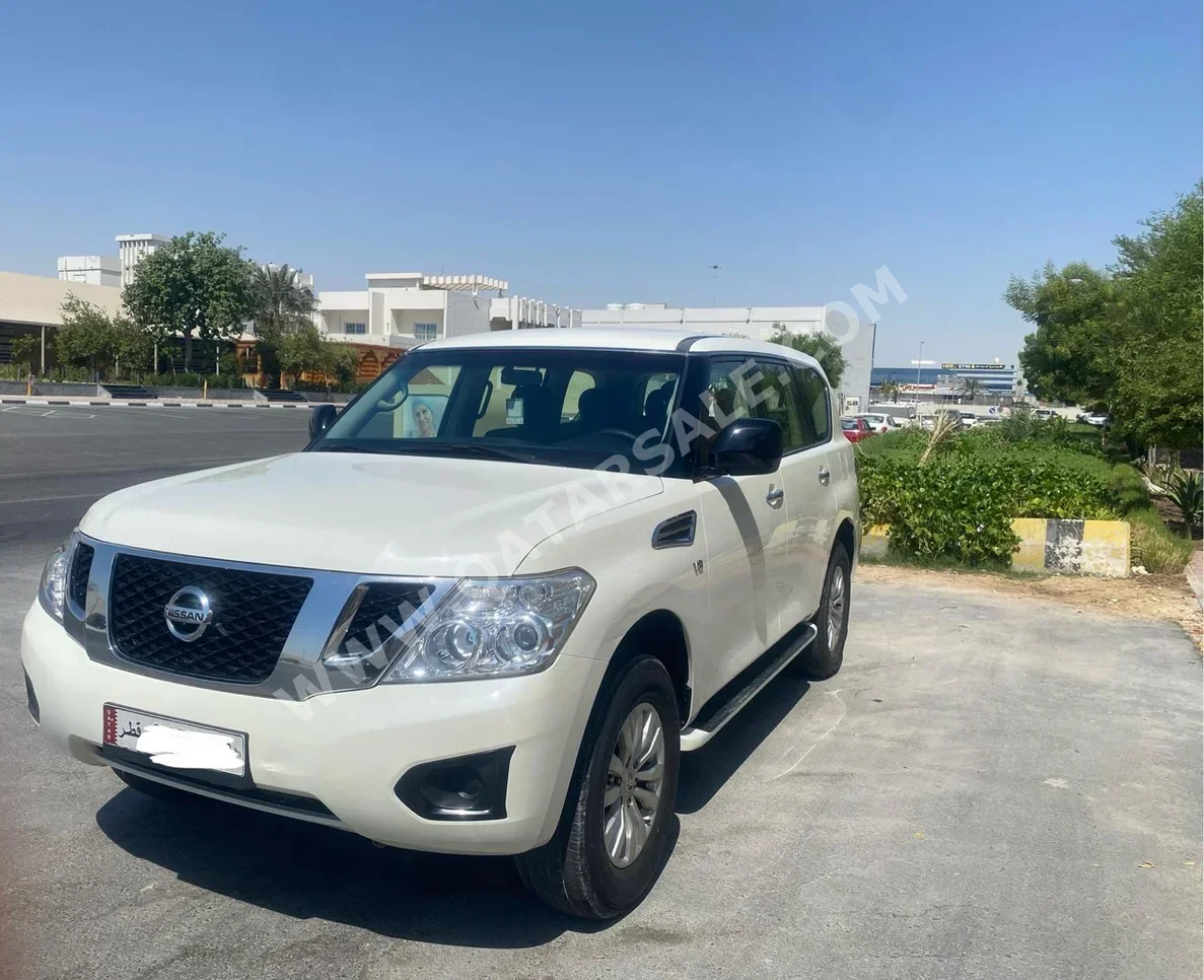 Nissan  Patrol  2014  Automatic  186,000 Km  6 Cylinder  Four Wheel Drive (4WD)  SUV  White