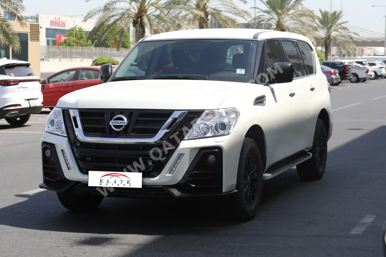 Nissan  Patrol  SE  2018  Automatic  50,000 Km  8 Cylinder  Four Wheel Drive (4WD)  SUV  White