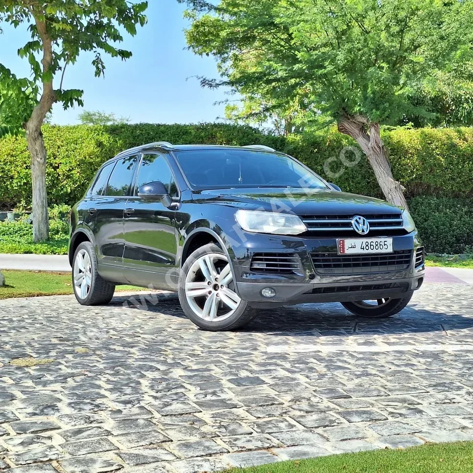 Volkswagen  Touareg  2012  Automatic  190,000 Km  6 Cylinder  All Wheel Drive (AWD)  SUV  Black