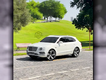 Bentley  Bentayga  2018  Automatic  36,000 Km  12 Cylinder  Four Wheel Drive (4WD)  SUV  White  With Warranty