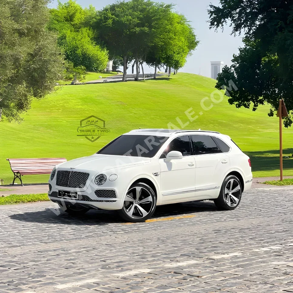 Bentley  Bentayga  2018  Automatic  36,000 Km  12 Cylinder  Four Wheel Drive (4WD)  SUV  White  With Warranty