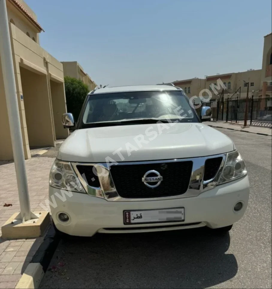 Nissan  Patrol  LE  2010  Automatic  181,000 Km  8 Cylinder  Four Wheel Drive (4WD)  SUV  White