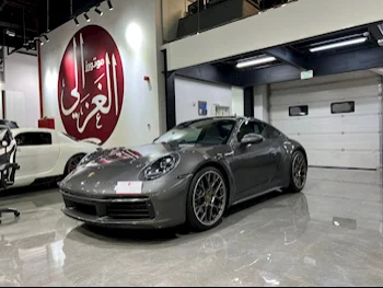 Porsche  911  Carrera  2021  Automatic  44,000 Km  6 Cylinder  Rear Wheel Drive (RWD)  Coupe / Sport  Gray  With Warranty