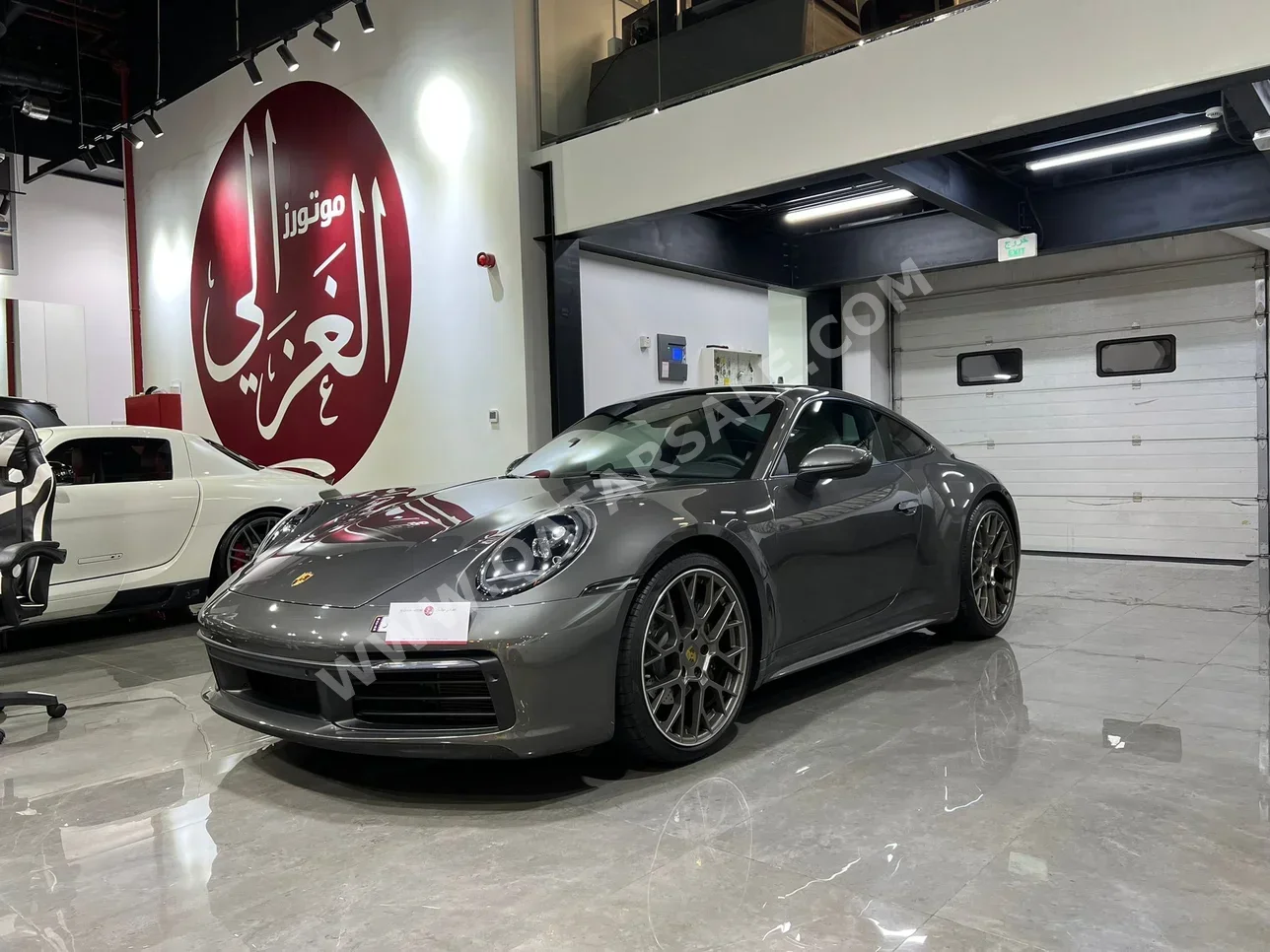 Porsche  911  Carrera  2021  Automatic  44,000 Km  6 Cylinder  Rear Wheel Drive (RWD)  Coupe / Sport  Gray  With Warranty