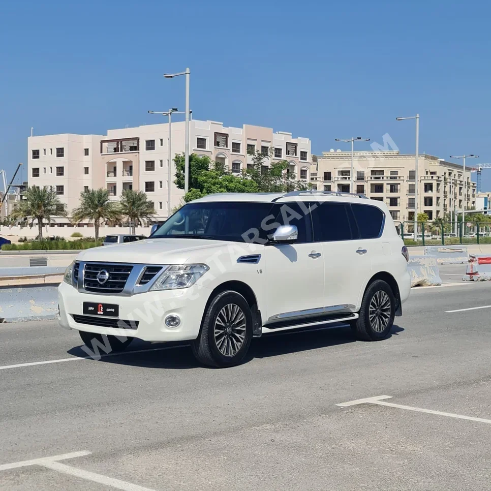 Nissan  Patrol  Platinum  2014  Automatic  590,000 Km  8 Cylinder  Four Wheel Drive (4WD)  SUV  White