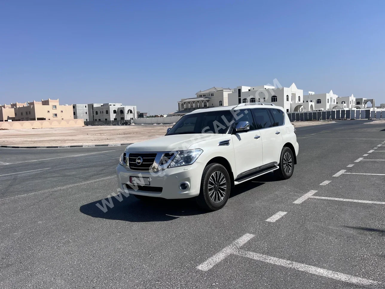 Nissan  Patrol  Platinum  2014  Automatic  295,000 Km  8 Cylinder  Four Wheel Drive (4WD)  SUV  White