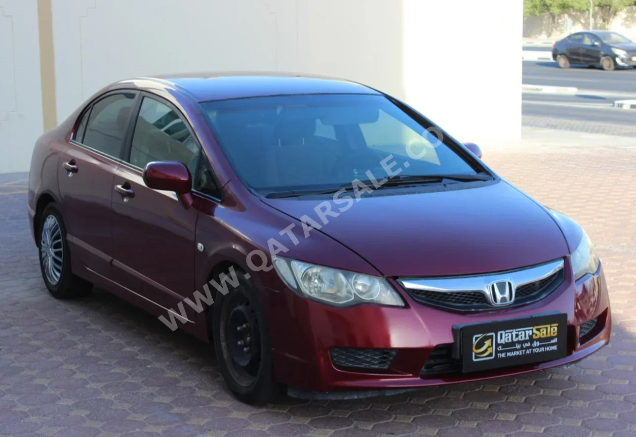 Honda  Civic  2010  Automatic  147,000 Km  4 Cylinder  Front Wheel Drive (FWD)  Sedan  Red