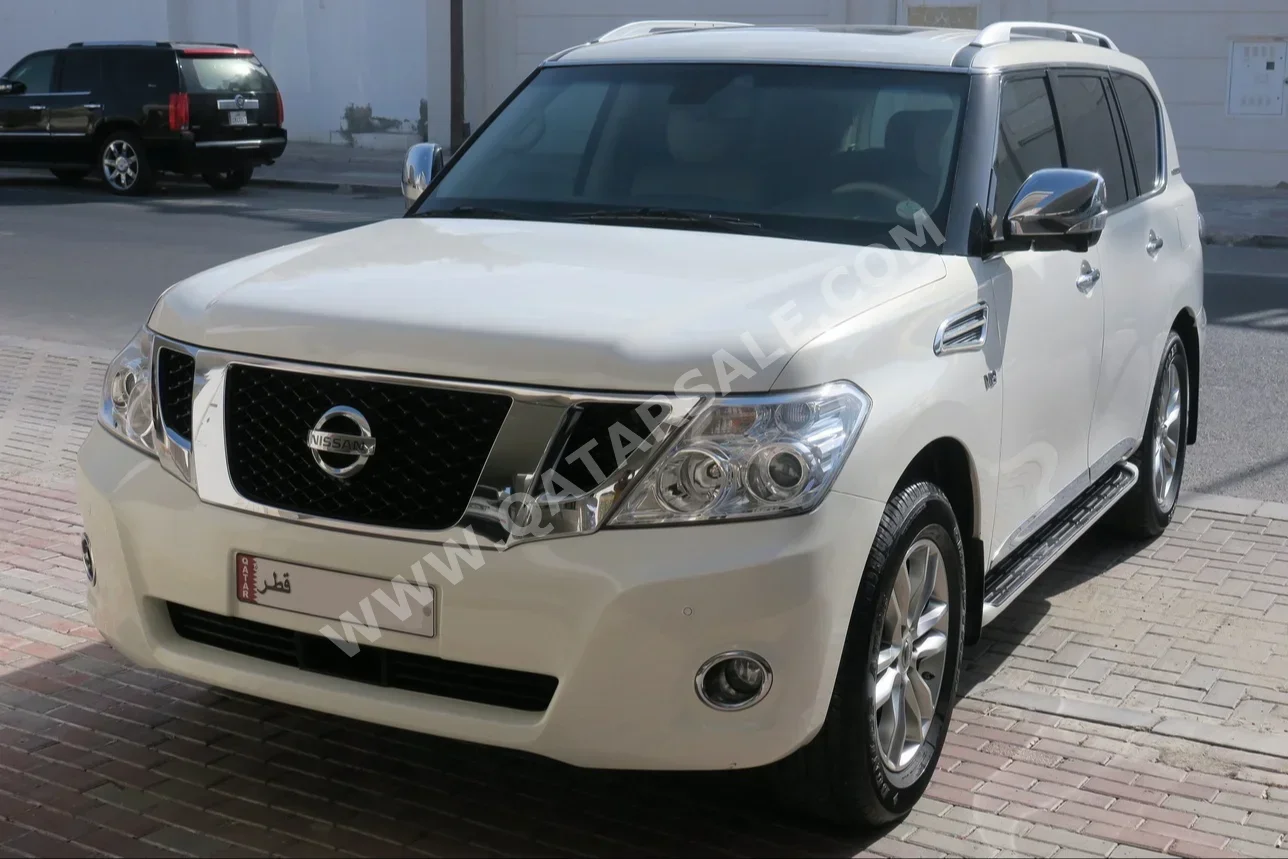 Nissan  Patrol  LE  2012  Automatic  140,600 Km  8 Cylinder  Four Wheel Drive (4WD)  SUV  White