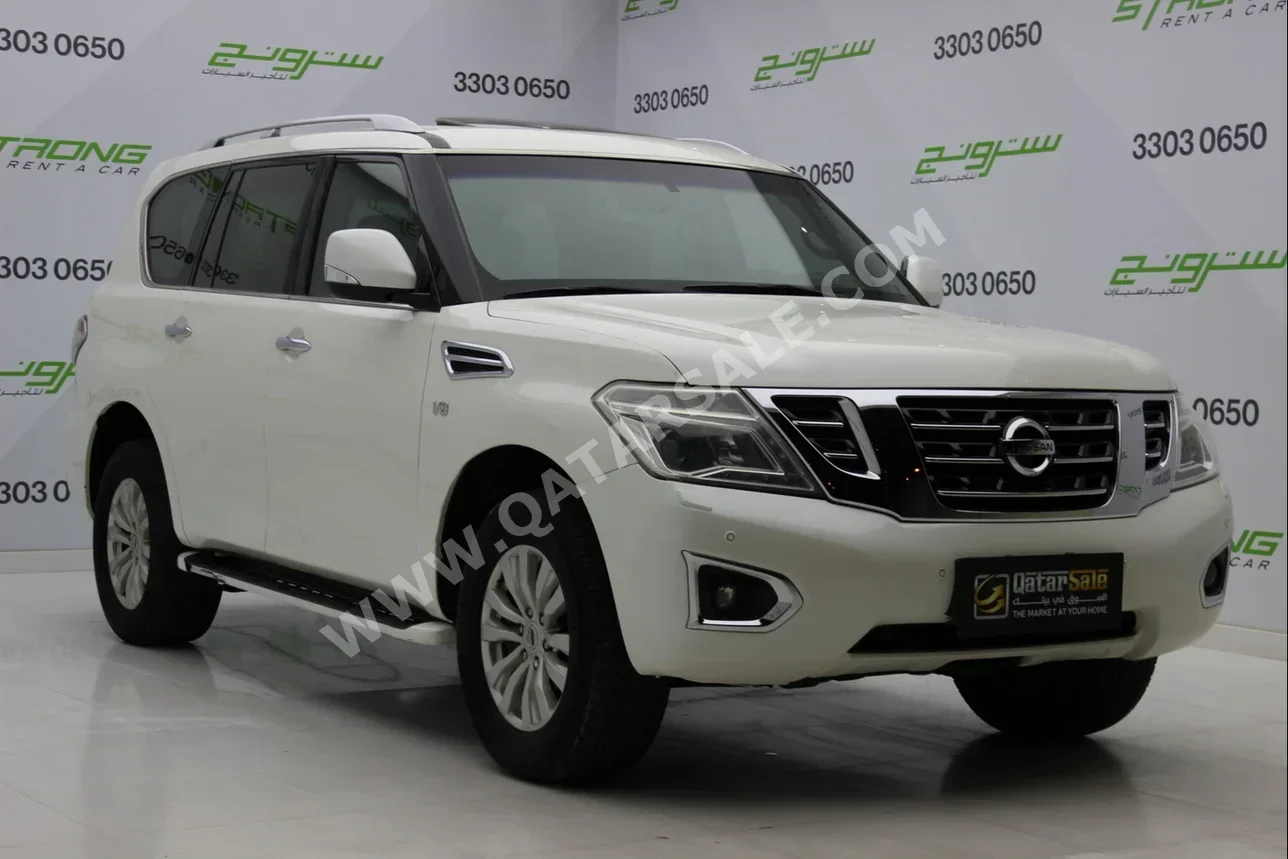 Nissan  Patrol  SE  2014  Automatic  285,000 Km  8 Cylinder  Four Wheel Drive (4WD)  SUV  Pearl