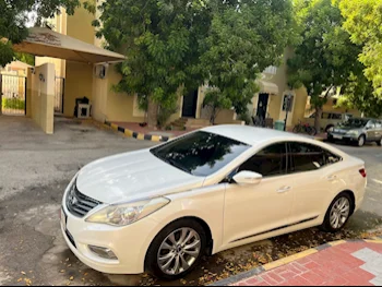 Hyundai  Azera  2015  Automatic  55,000 Km  4 Cylinder  Front Wheel Drive (FWD)  Sedan  White