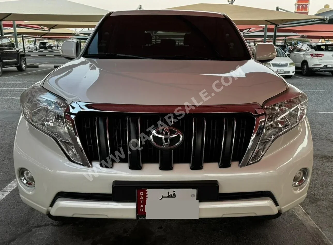 Toyota  Prado  TXL  2014  Automatic  108,000 Km  6 Cylinder  Four Wheel Drive (4WD)  SUV  White