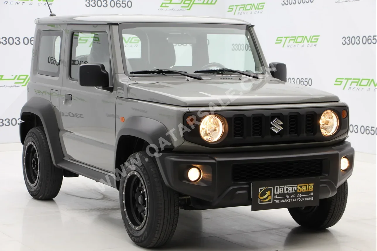 Suzuki  Jimny  2021  Automatic  75,000 Km  4 Cylinder  Four Wheel Drive (4WD)  SUV  Gray  With Warranty