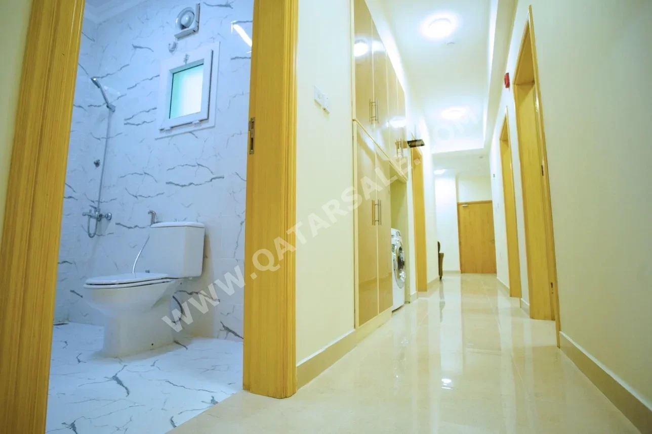 4 Bedrooms  Apartment  For Rent  in Doha -  Najma  Fully Furnished