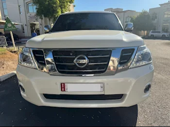 Nissan  Patrol  Platinum  2014  Automatic  180٬000 Km  8 Cylinder  Four Wheel Drive (4WD)  SUV  White