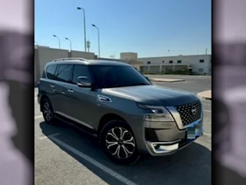 Nissan  Patrol  Titanium  2022  Automatic  32,000 Km  6 Cylinder  Four Wheel Drive (4WD)  SUV  Dark Gray  With Warranty