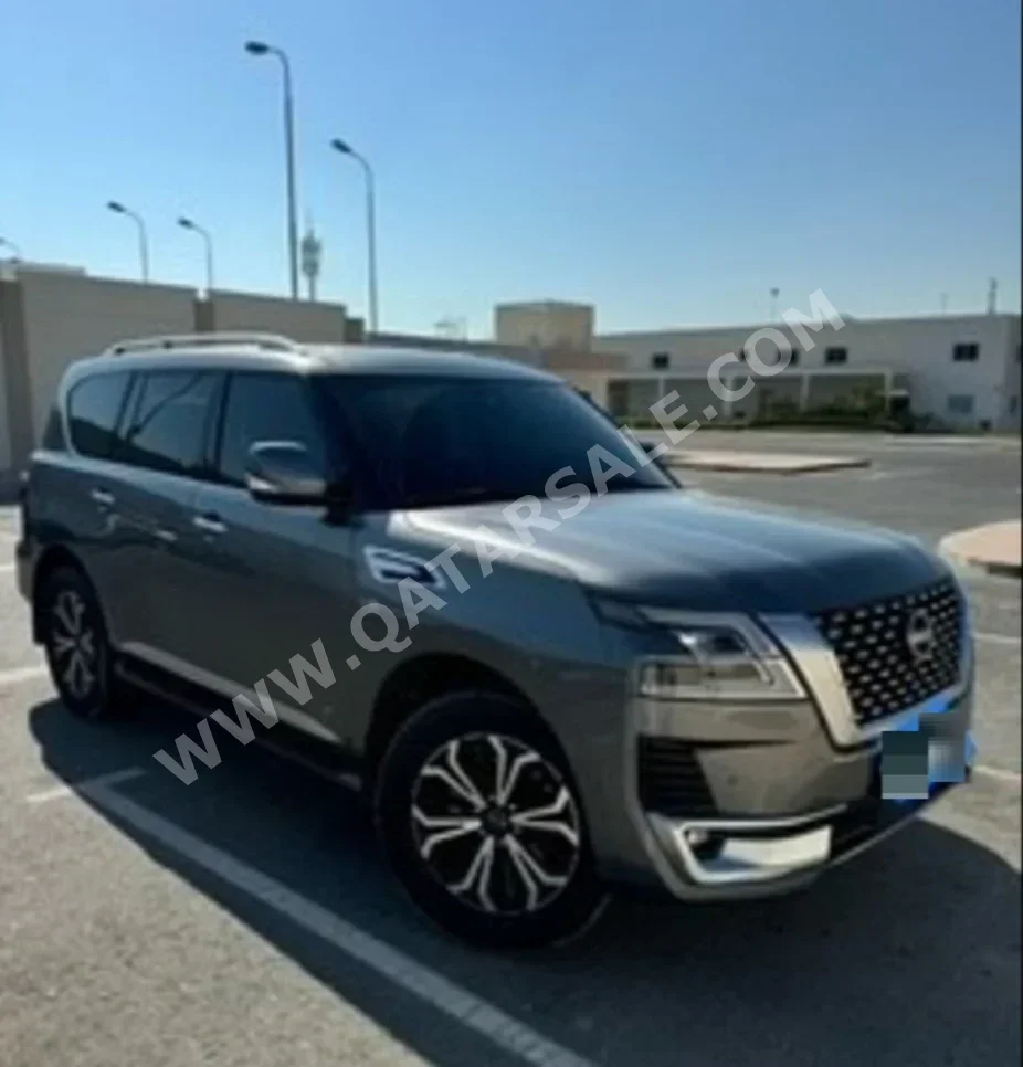 Nissan  Patrol  Titanium  2022  Automatic  32,000 Km  6 Cylinder  Four Wheel Drive (4WD)  SUV  Dark Gray  With Warranty