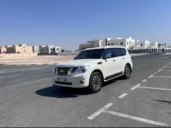  Nissan  Patrol  Platinum  2014  Automatic  295,000 Km  8 Cylinder  Four Wheel Drive (4WD)  SUV  White  With Warranty