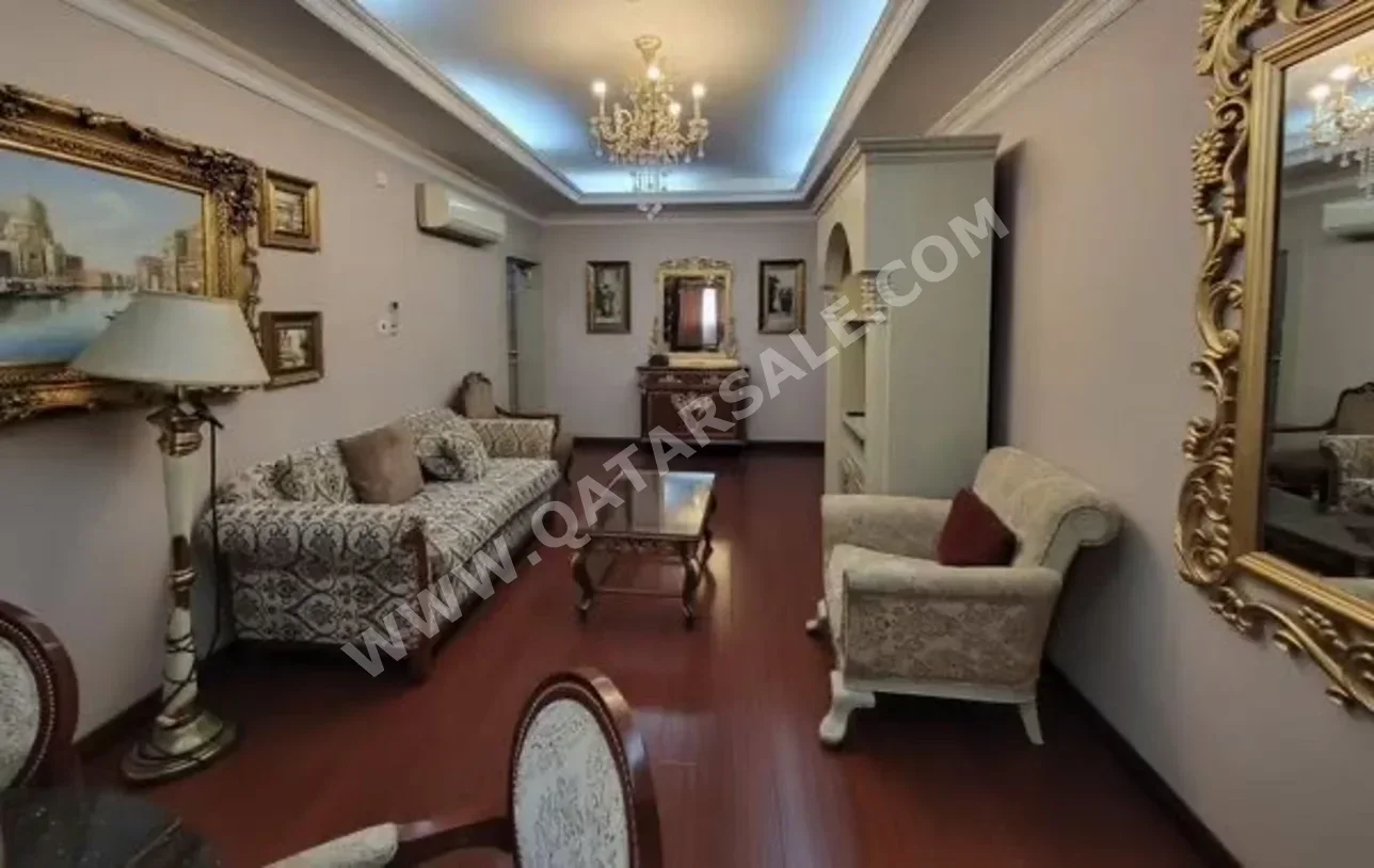 2 Bedrooms  Apartment  For Rent  in Doha -  Al Mansoura  Fully Furnished