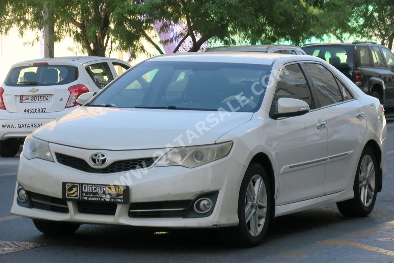  Toyota  Camry  GLX  2013  Automatic  179,000 Km  4 Cylinder  Front Wheel Drive (FWD)  Sedan  Pearl  With Warranty