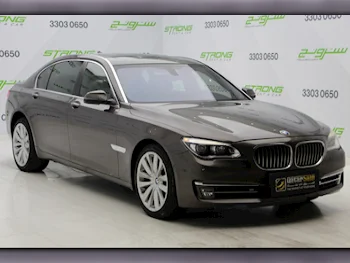  BMW  7-Series  750 Li  2014  Automatic  193,000 Km  8 Cylinder  Rear Wheel Drive (RWD)  Sedan  Brown  With Warranty