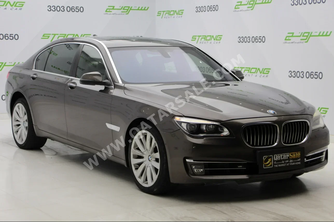  BMW  7-Series  750 Li  2014  Automatic  193,000 Km  8 Cylinder  Rear Wheel Drive (RWD)  Sedan  Brown  With Warranty