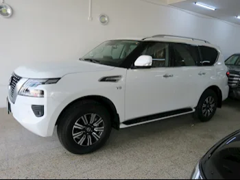 Nissan  Patrol  LE  2024  Automatic  0 Km  8 Cylinder  Four Wheel Drive (4WD)  SUV  White  With Warranty