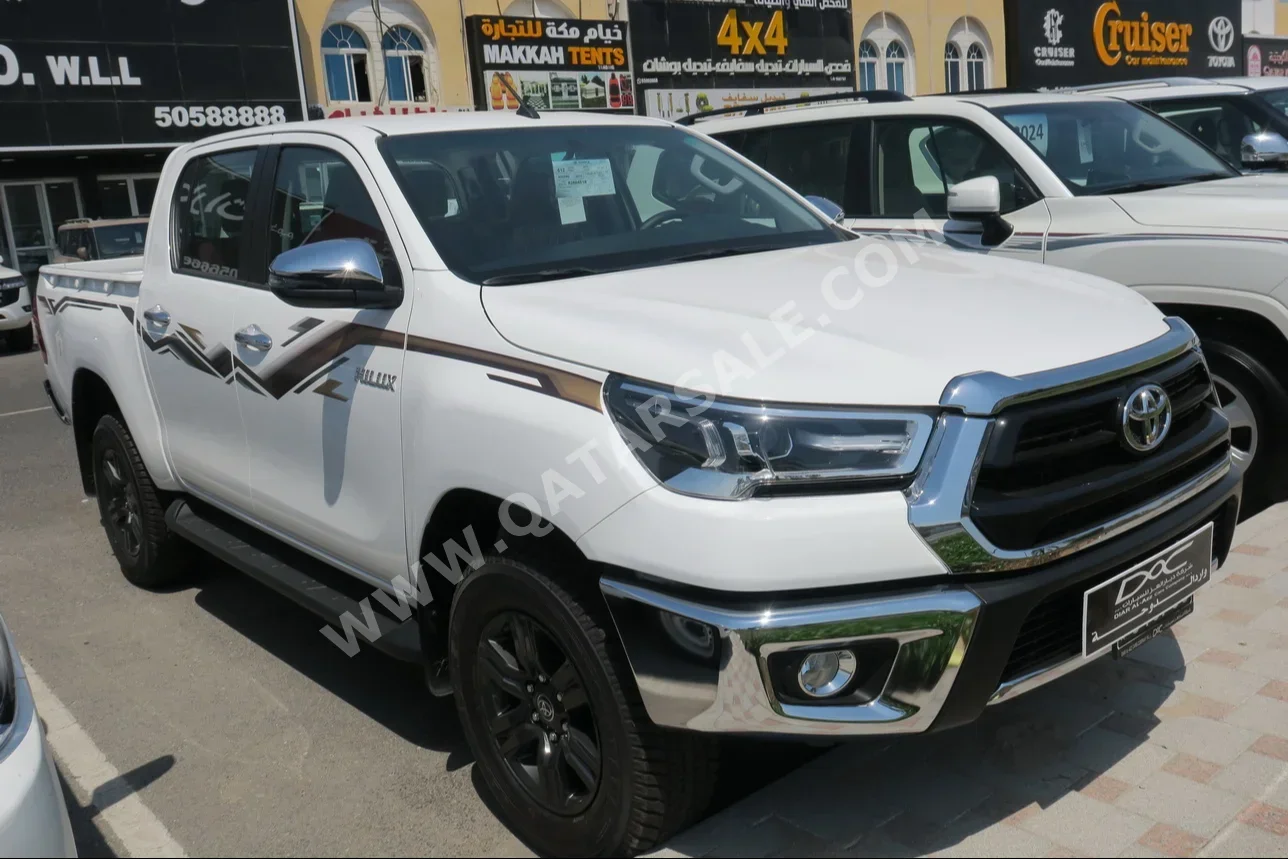 Toyota  Hilux  2024  Automatic  0 Km  4 Cylinder  Four Wheel Drive (4WD)  Pick Up  White  With Warranty