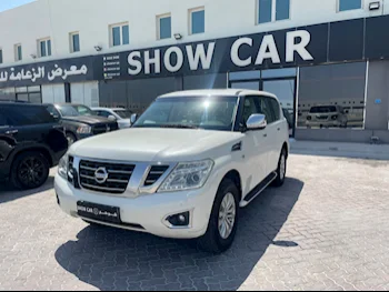 Nissan  Patrol  SE  2014  Automatic  227,000 Km  8 Cylinder  Four Wheel Drive (4WD)  SUV  White